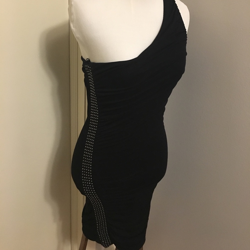 Guess bodycon dress with studs size S

b